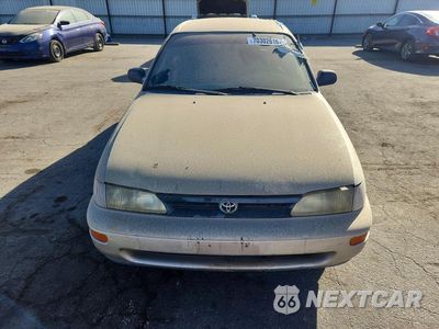 Piąte zdjęcie samochodu w środku: 1995 TOYOTA COROLLA DX VIN:1NXAE09B2SZ329302 - miniatura