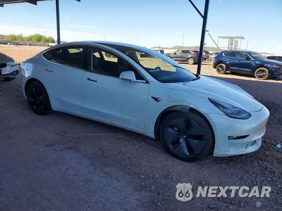 Czwarte zdjęcie samochodu z boku: 2019 TESLA MODEL 3 VIN:5YJ3E1EB9KF436932 - miniatura