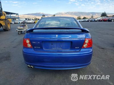 Zdjęcie 6 z 12 samochodu: 2004 PONTIAC GTO VIN:6G2VX12G24L285328 - miniatura