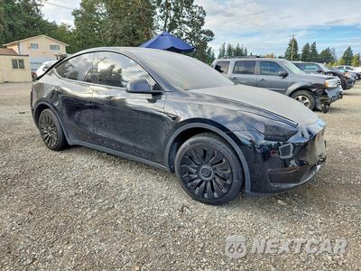 Czwarte zdjęcie samochodu z boku: 2023 TESLA MODEL Y VIN:7SAYGDEE4PF859861 - miniatura
