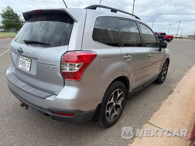 Czwarte zdjęcie samochodu z boku: 2014 SUBARU FORESTER 2.0XT TOURING VIN:JF2SJGPC9EH473176 - miniatura