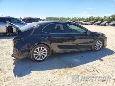 Trzecie zdjęcie samochodu z tyłu: 2023 TOYOTA CAMRY LE VIN:4T1C11AK9PU079120 - miniatura