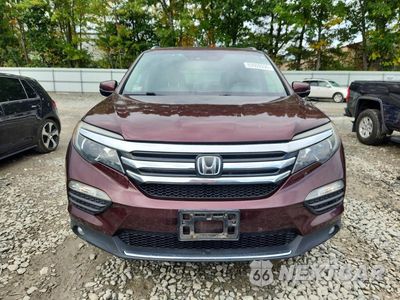 Piąte zdjęcie samochodu w środku: 2016 HONDA PILOT ELITE VIN:5FNYF6H04GB111302 - miniatura