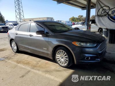 Czwarte zdjęcie samochodu z boku: 2015 FORD FUSION SE PHEV VIN:3FA6P0PU4FR280485 - miniatura