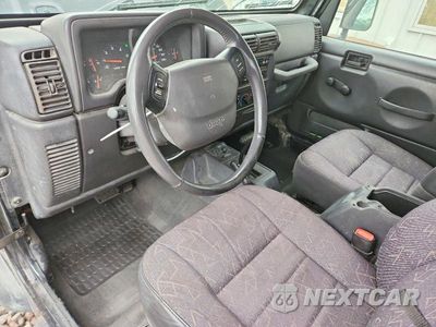 Zdjęcie 8 z 13 samochodu: 2001 JEEP WRANGLER / TJ SPORT VIN:1J4FA49S11P324080 - miniatura