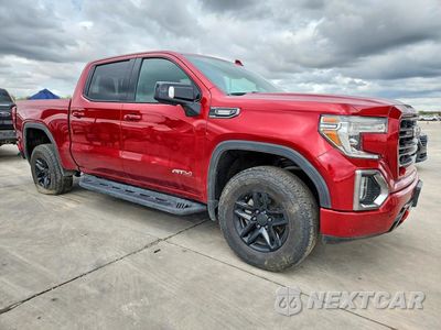 Czwarte zdjęcie samochodu z boku: 2021 GMC SIERRA K1500 AT4 VIN:1GTU9EET5MZ284993 - miniatura