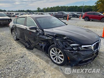 Czwarte zdjęcie samochodu z boku: 2017 BMW 740 XE VIN:WBA7J2C30HG497953 - miniatura