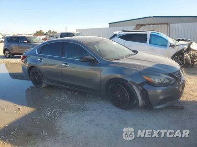 Czwarte zdjęcie samochodu z boku: 2018 NISSAN ALTIMA 2.5 SR VIN:1N4AL3AP6JC196850 - miniatura