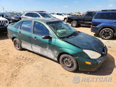 Czwarte zdjęcie samochodu z boku: 2001 FORD FOCUS LX VIN:1FAFP33P81W296096 - miniatura