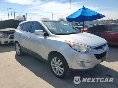 Czwarte zdjęcie samochodu z boku: 2010 HYUNDAI TUCSON LIMITED VIN:KM8JU3AC7AU021260 - miniatura