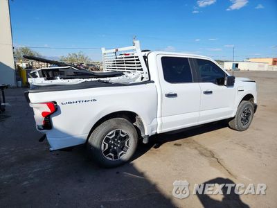 Trzecie zdjęcie samochodu z tyłu: 2023 FORD F150 LIGHTNING PRO VIN:1FTVW1EL6PWG41304 - miniatura