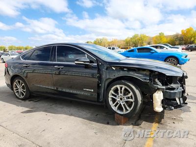 Czwarte zdjęcie samochodu z boku: 2019 FORD FUSION TITANIUM VIN:3FA6P0RU3KR272952 - miniatura