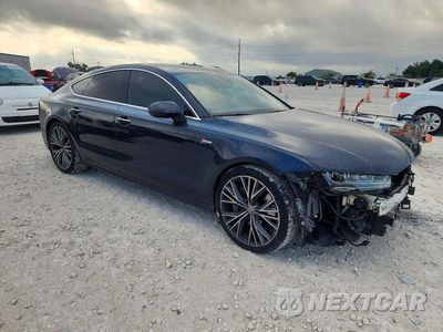 Czwarte zdjęcie samochodu z boku: 2016 AUDI A7 PRESTIGE VIN:WAU2GAFC4GN192934 - miniatura