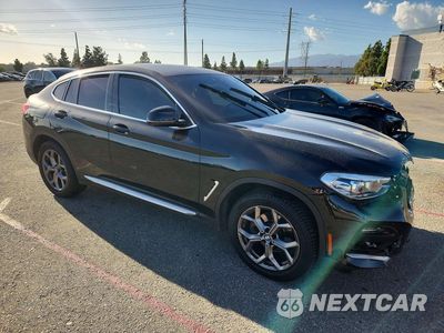 Czwarte zdjęcie samochodu z boku: 2021 BMW X4 XDRIVE30I VIN:5UX2V1C05M9G91217 - miniatura