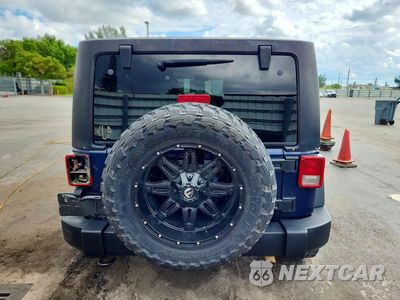 Zdjęcie 6 z 12 samochodu: 2013 JEEP WRANGLER UNLIMITED SPORT VIN:1C4BJWDG0DL504178 - miniatura