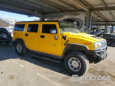 Czwarte zdjęcie samochodu z boku: 2005 HUMMER H2 VIN:5GRGN23U65H129183 - miniatura