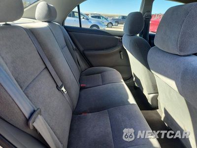 Zdjęcie 10 z 12 samochodu: 2003 TOYOTA COROLLA CE VIN:JTDBR32E430017123 - miniatura