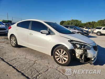 Czwarte zdjęcie samochodu z boku: 2014 KIA FORTE LX VIN:KNAFX4A67E5217309 - miniatura