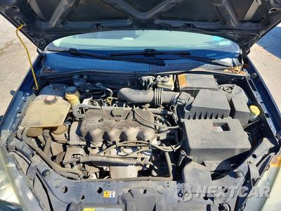 Zdjęcie 11 z 12 samochodu: 2004 FORD FOCUS LX VIN:1FAFP33P44W201800 - miniatura