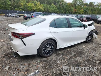 Trzecie zdjęcie samochodu z tyłu: 2024 TOYOTA CAMRY HYBRID SE VIN:4T1S31AK9RU078459 - miniatura