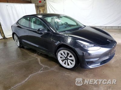 Czwarte zdjęcie samochodu z boku: 2022 TESLA MODEL 3 VIN:5YJ3E1EA3NF371474 - miniatura