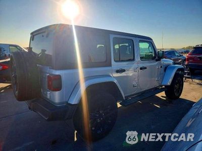 Trzecie zdjęcie samochodu z tyłu: 2023 JEEP WRANGLER SAHARA 4XE VIN:1C4JJXP69PW642647 - miniatura