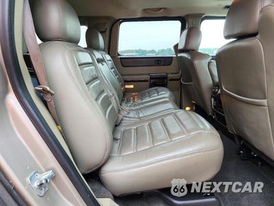 Zdjęcie 11 z 13 samochodu: 2003 HUMMER H2 VIN:5GRGN23U63H137636 - miniatura