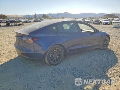 Trzecie zdjęcie samochodu z tyłu: 2023 TESLA MODEL 3 VIN:5YJ3E1EA5PF576264 - miniatura