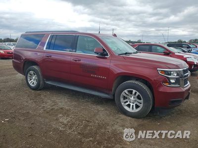 Czwarte zdjęcie samochodu z boku: 2016 CHEVROLET SUBURBAN K1500 LS VIN:1GNSKGEC1GR325414 - miniatura