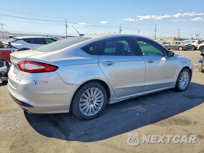 Trzecie zdjęcie samochodu z tyłu: 2016 FORD FUSION SE HYBRID VIN:3FA6P0LU0GR305437 - miniatura