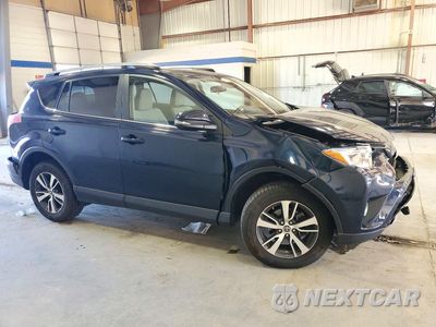Czwarte zdjęcie samochodu z boku: 2018 TOYOTA RAV4 XLE VIN:JTMRFREV9JJ235930 - miniatura