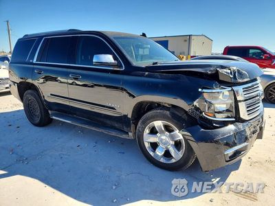 Czwarte zdjęcie samochodu z boku: 2015 CHEVROLET TAHOE C1500 LTZ VIN:1GNSCCKC0FR570052 - miniatura