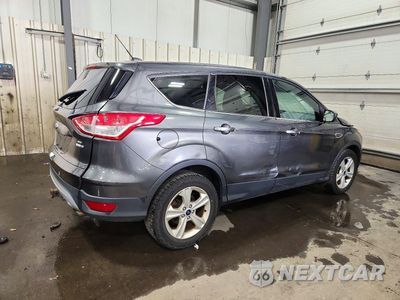 Trzecie zdjęcie samochodu z tyłu: 2016 FORD ESCAPE SE VIN:1FMCU9G96GUB72607 - miniatura
