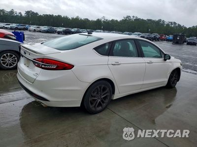 Trzecie zdjęcie samochodu z tyłu: 2018 FORD FUSION SE VIN:3FA6P0HD8JR153214 - miniatura