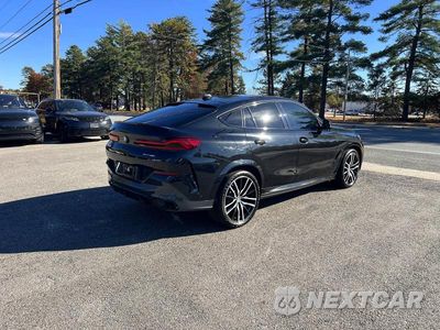 Czwarte zdjęcie samochodu z boku: 2022 BMW X6 XDRIVE40I VIN:5UXCY6C07N9L97714 - miniatura