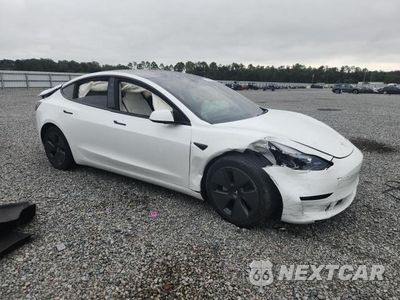 Czwarte zdjęcie samochodu z boku: 2023 TESLA MODEL 3 VIN:5YJ3E1EAXPF574249 - miniatura