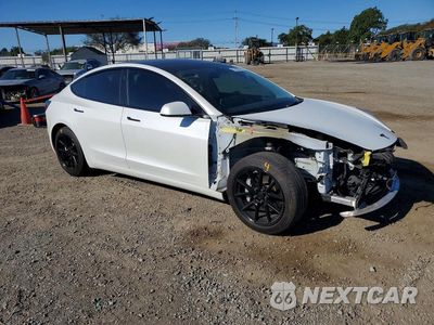 Czwarte zdjęcie samochodu z boku: 2022 TESLA MODEL 3 VIN:5YJ3E1EA1NF110568 - miniatura