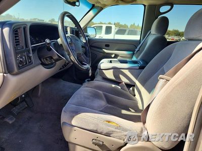 Zdjęcie 7 z 13 samochodu: 2005 GMC YUKON XL C1500 VIN:1GKEC16Z45J198418 - miniatura