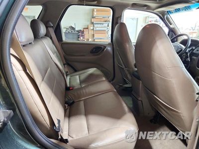 Zdjęcie 11 z 13 samochodu: 2001 FORD ESCAPE XLT VIN:1FMYU03111KF43404 - miniatura