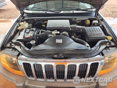 Zdjęcie 12 z 13 samochodu: 2000 JEEP GRAND CHEROKEE LAREDO VIN:1J4GW48N0YC241940 - miniatura