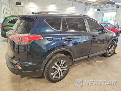 Trzecie zdjęcie samochodu z tyłu: 2018 TOYOTA RAV4 LE VIN:JTMZFREV6JJ734801 - miniatura