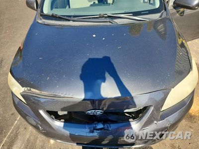 Zdjęcie 11 z 12 samochodu: 2009 TOYOTA COROLLA LE VIN:JTDBL40E59J043033 - miniatura