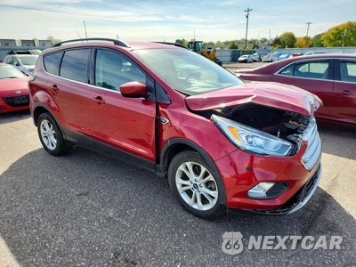 Czwarte zdjęcie samochodu z boku: 2018 FORD ESCAPE SEL VIN:1FMCU9HD2JUC39889 - miniatura