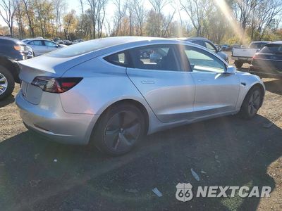 Trzecie zdjęcie samochodu z tyłu: 2018 TESLA MODEL 3 VIN:5YJ3E1EB8JF084893 - miniatura