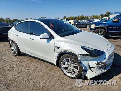 Czwarte zdjęcie samochodu z boku: 2023 TESLA MODEL Y VIN:7SAYGDEE0PF759465 - miniatura