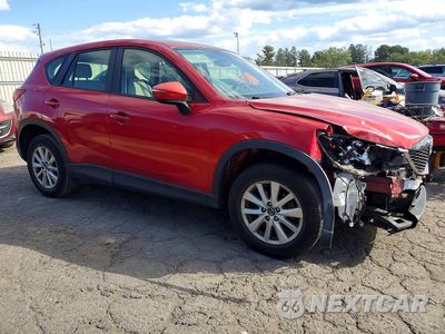 Czwarte zdjęcie samochodu z boku: 2015 MAZDA CX-5 SPORT VIN:JM3KE2BEXF0471068 - miniatura