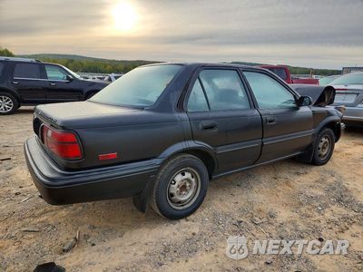 Trzecie zdjęcie samochodu z tyłu: 1992 TOYOTA COROLLA DX VIN:2T1AE94A8NC180144 - miniatura