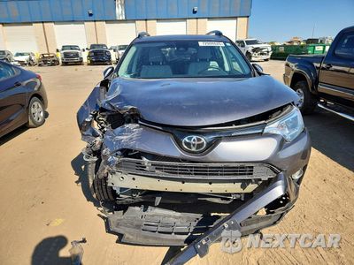 Piąte zdjęcie samochodu w środku: 2017 TOYOTA RAV4 XLE VIN:2T3RFREV0HW694338 - miniatura