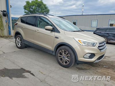 Czwarte zdjęcie samochodu z boku: 2017 FORD ESCAPE SE VIN:1FMCU9GD0HUB35008 - miniatura