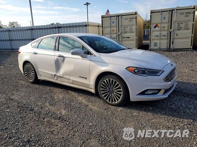 Czwarte zdjęcie samochodu z boku: 2017 FORD FUSION TITANIUM HEV VIN:3FA6P0RU4HR399914 - miniatura